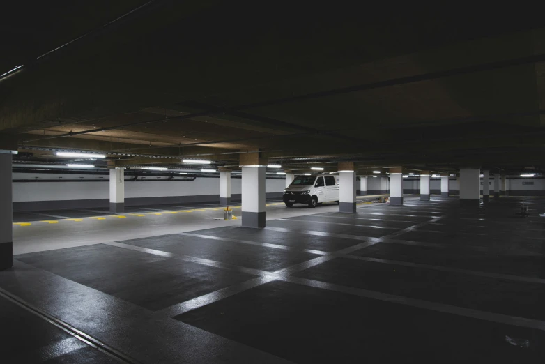 a truck is parked in a parking garage