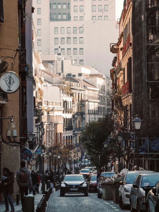 the city streets and buildings are crowded with people