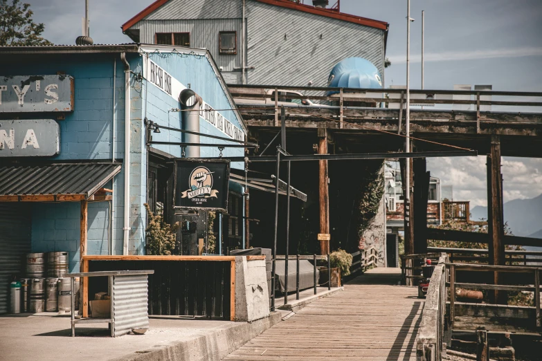 a blue building with a sign that says pete's bar on the outside