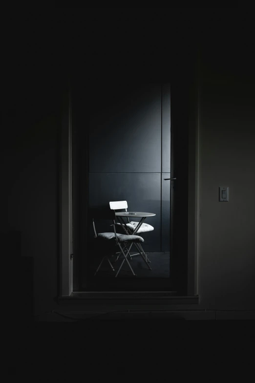 an image of the light coming from behind a chair