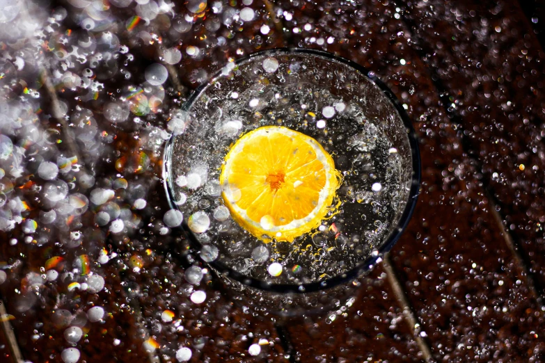 a single orange in a dirty martini glass