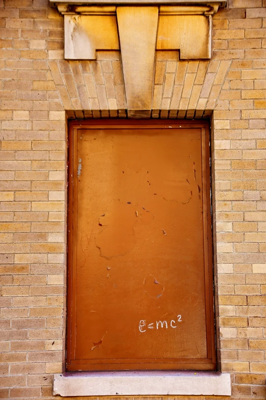a doorway sits in the corner of an old building