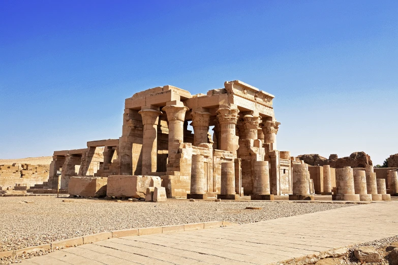 large building in middle of plain on sunny day