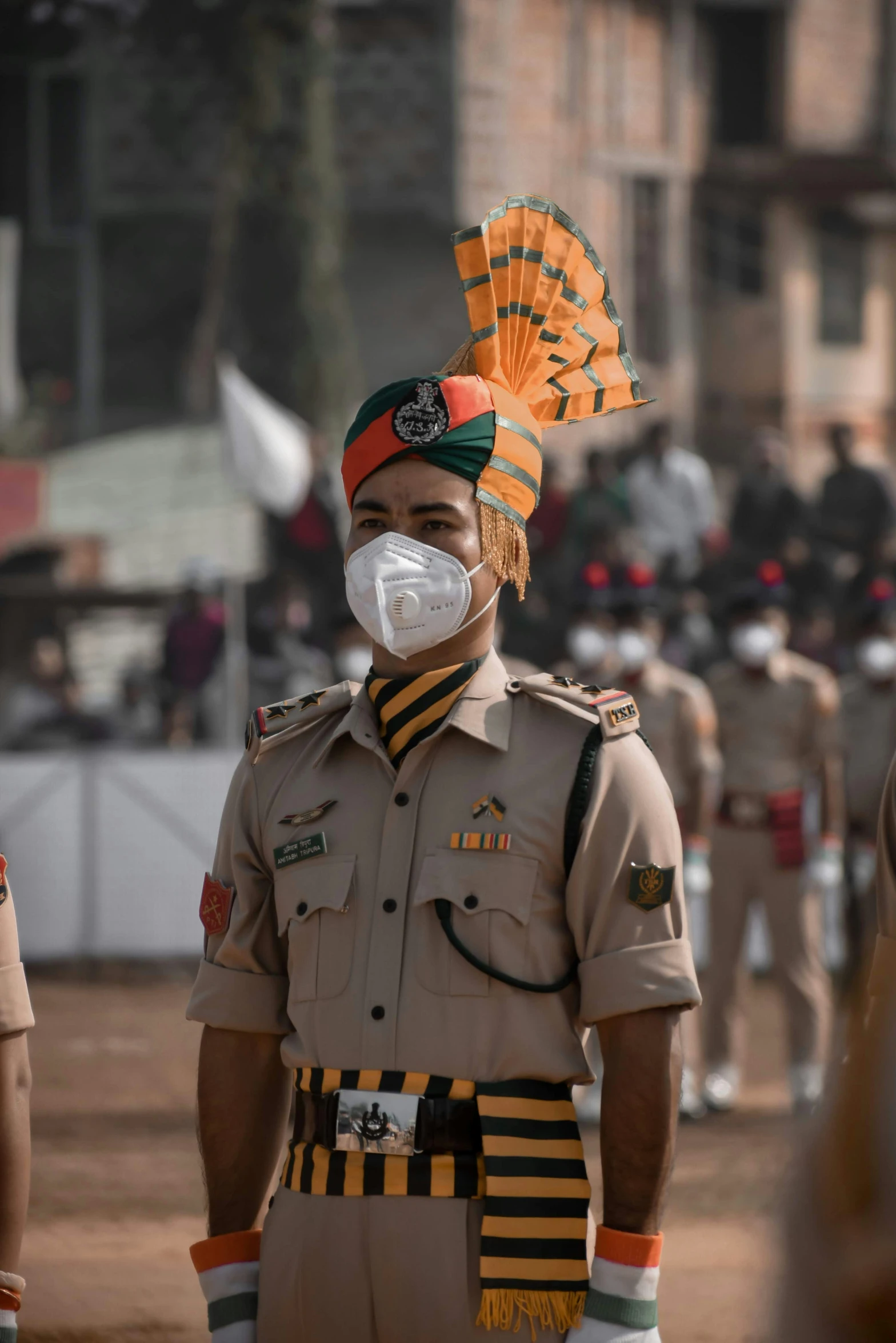 a soldier is wearing a surgical mask and indian headdress