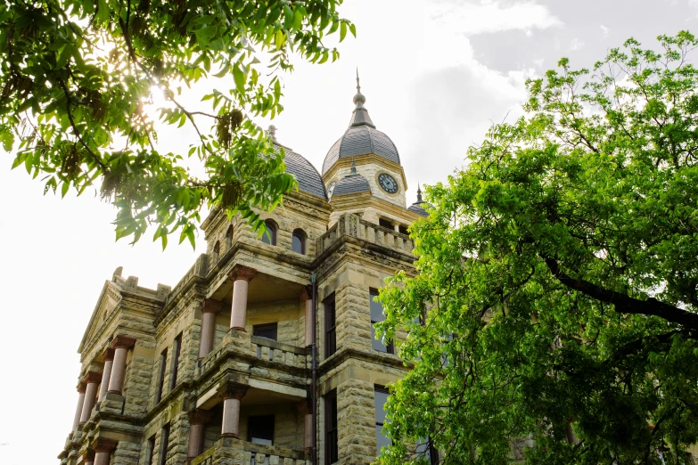 an old brick building has an ornate tower