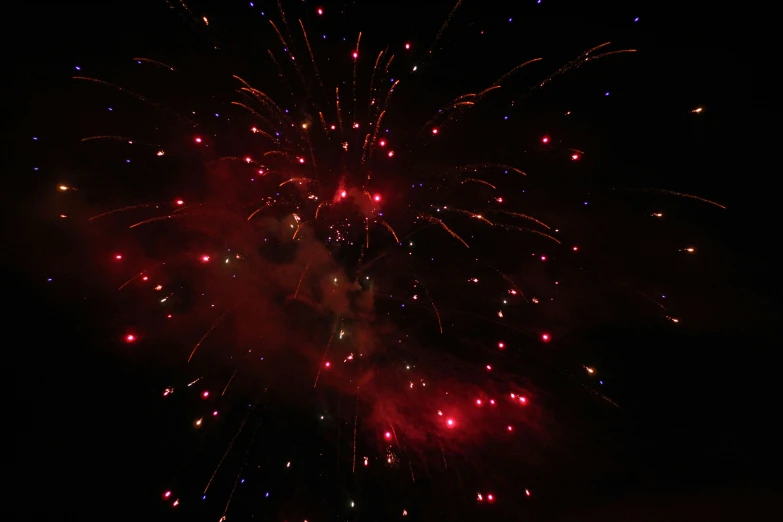 a firework display in the night sky