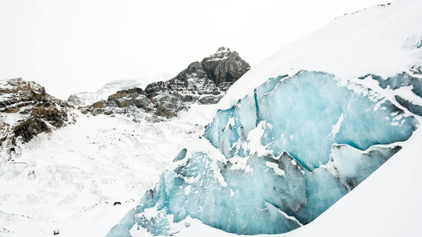 the steep glacier has ice on it's face