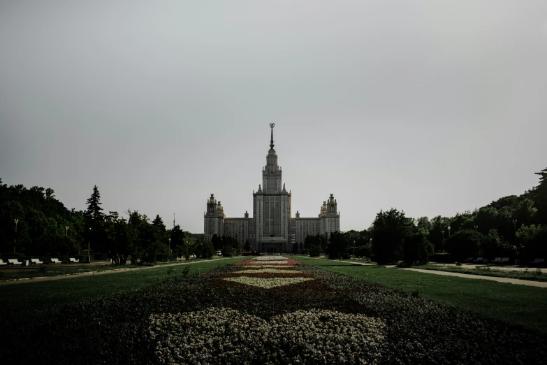 view of building with clock tower with a clock in the center of the image