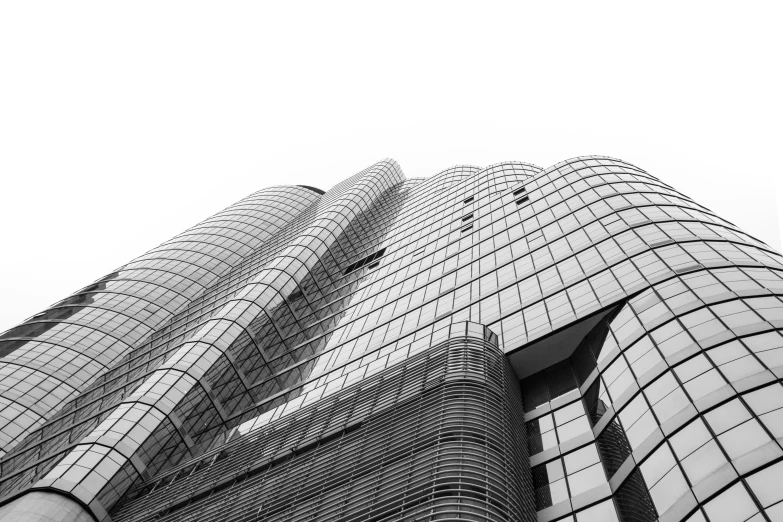 the top of an upward view of two buildings