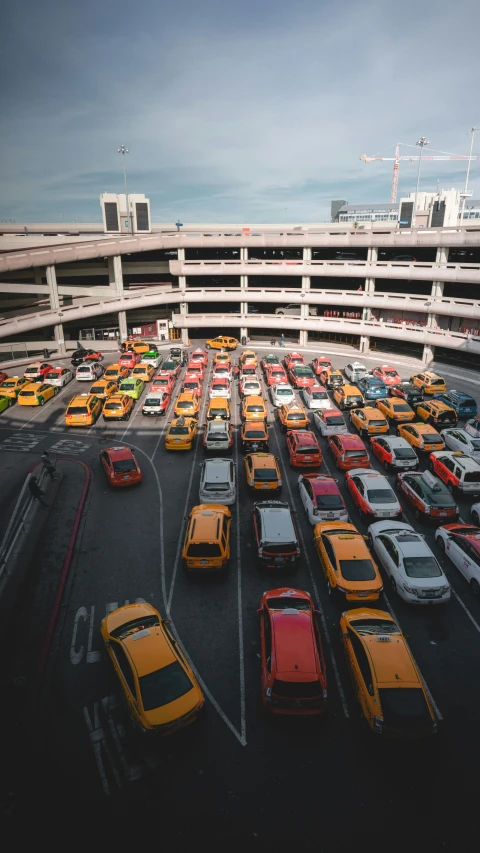 a parking lot full of a number of cars