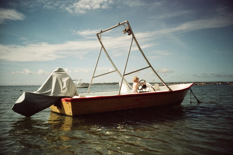 a boat with its hulls extended out on the water