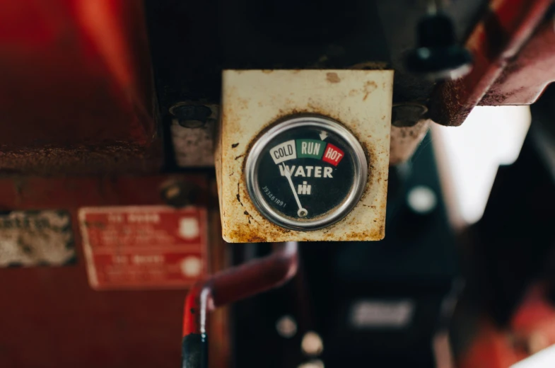 an old water meter is attached to a vehicle