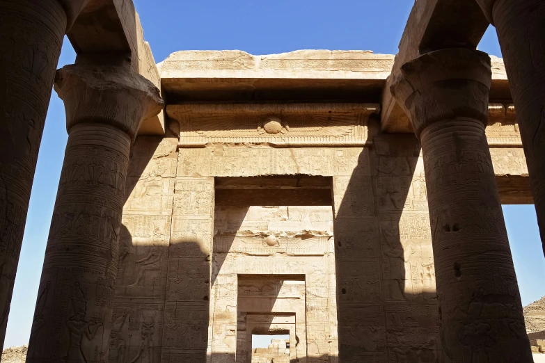 the doorway to an old temple in egypt