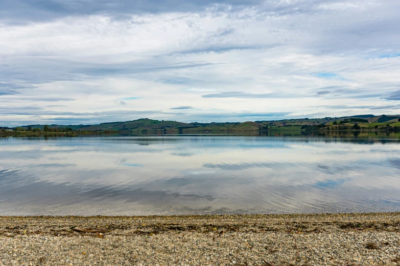 the view of the water from across a lake