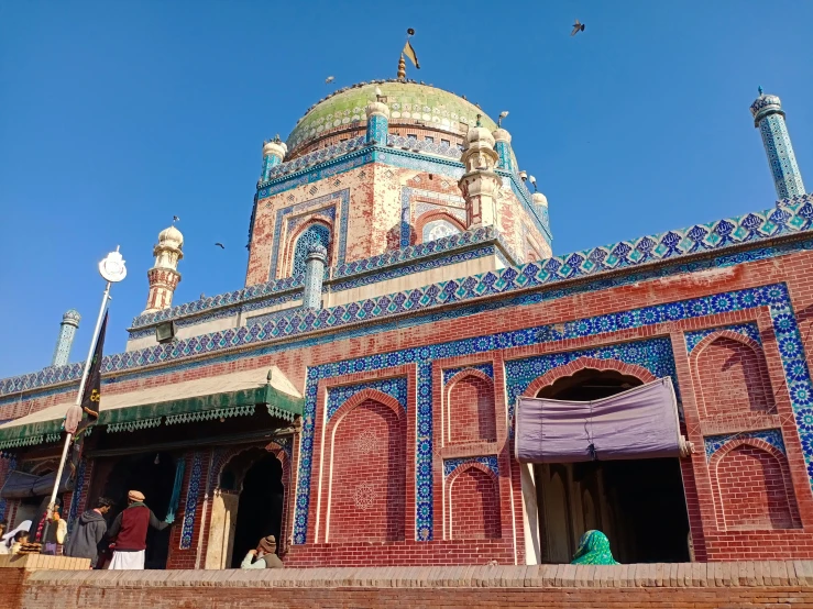 a large building with an ornate blue and gold decoration