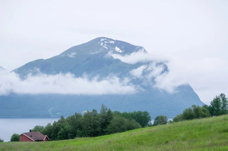 a picture taken on an island with a mountain in the distance