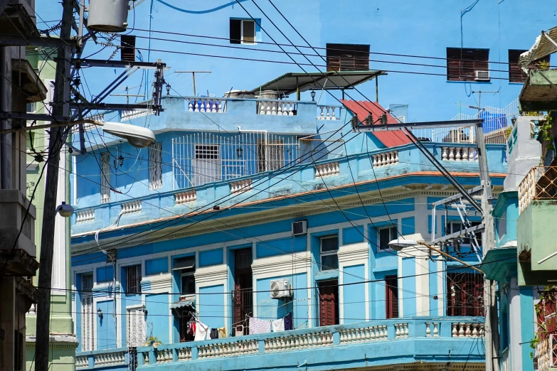 blue buildings are in front of each other