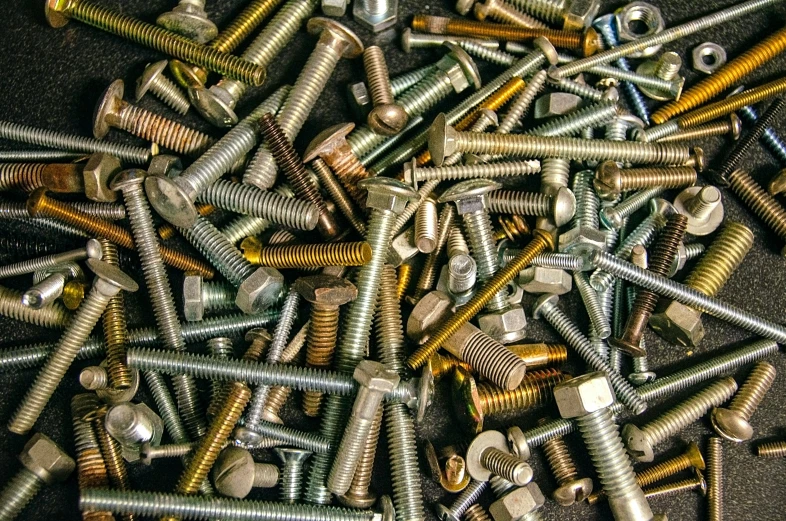 lots of nuts and bolts sitting together