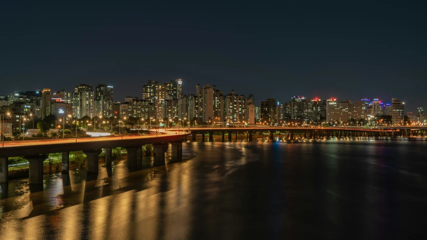 there is a very long bridge in the middle of the water