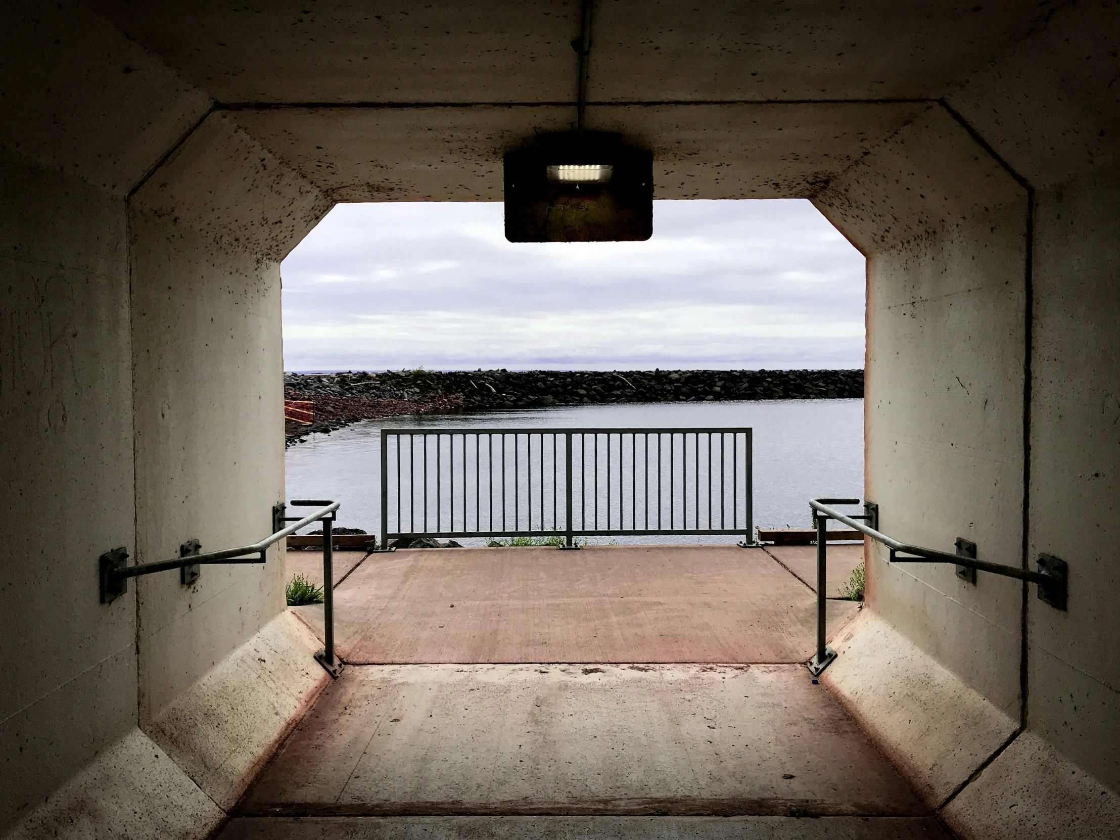 a view out a door on a walkway of some sort