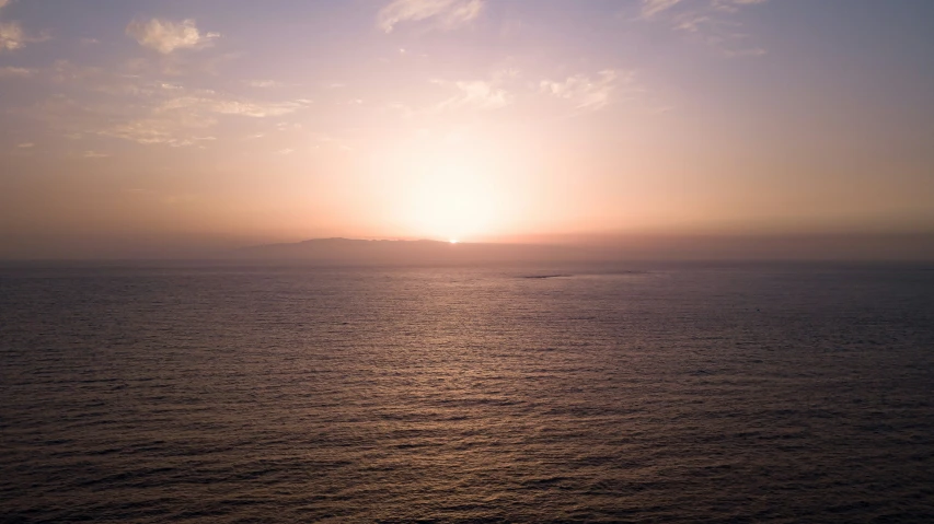 a view from the side of a large body of water