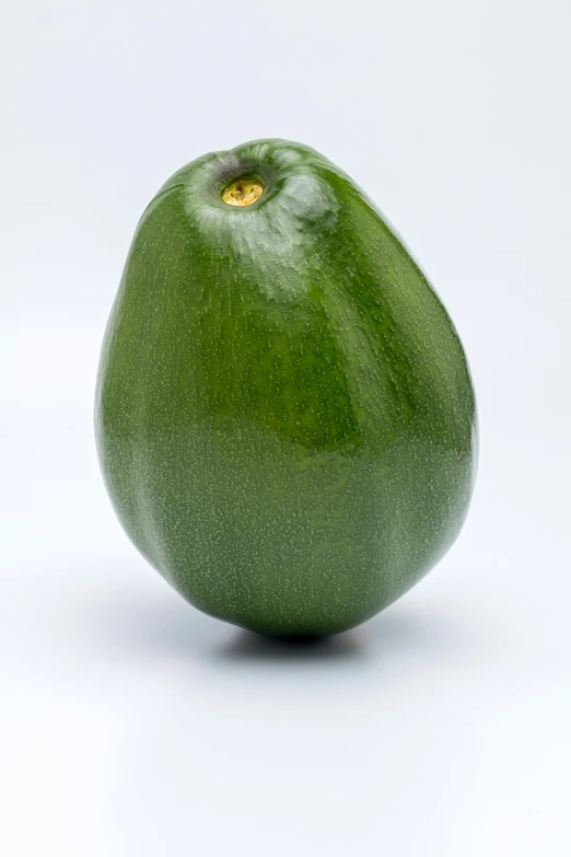 a green colored vegetable with a yellow eye