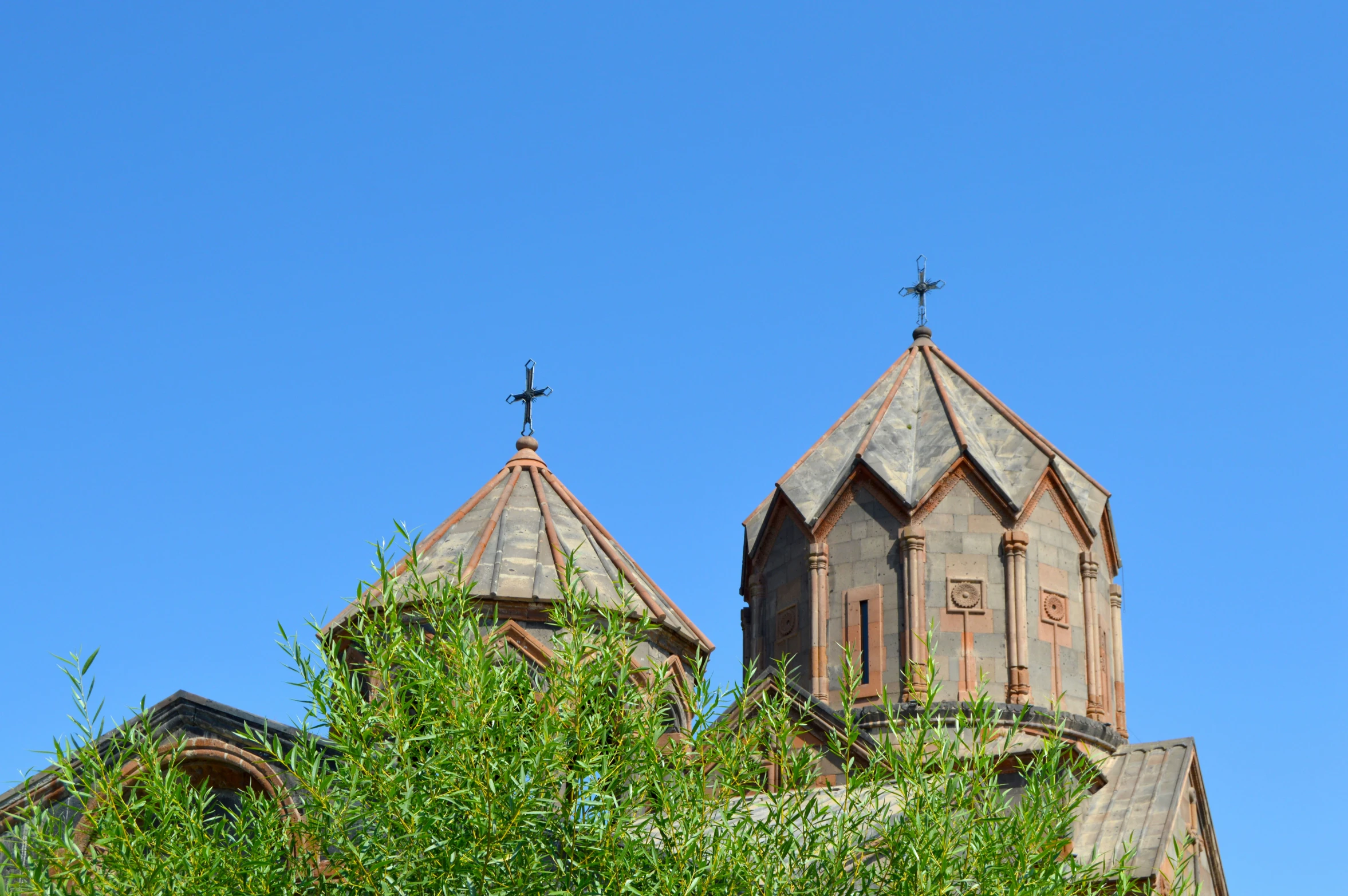 two towers on the top of a church