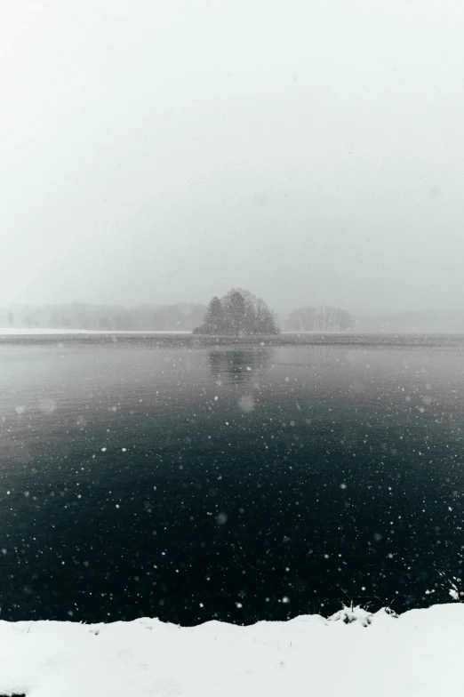 black and white image of water in the snow