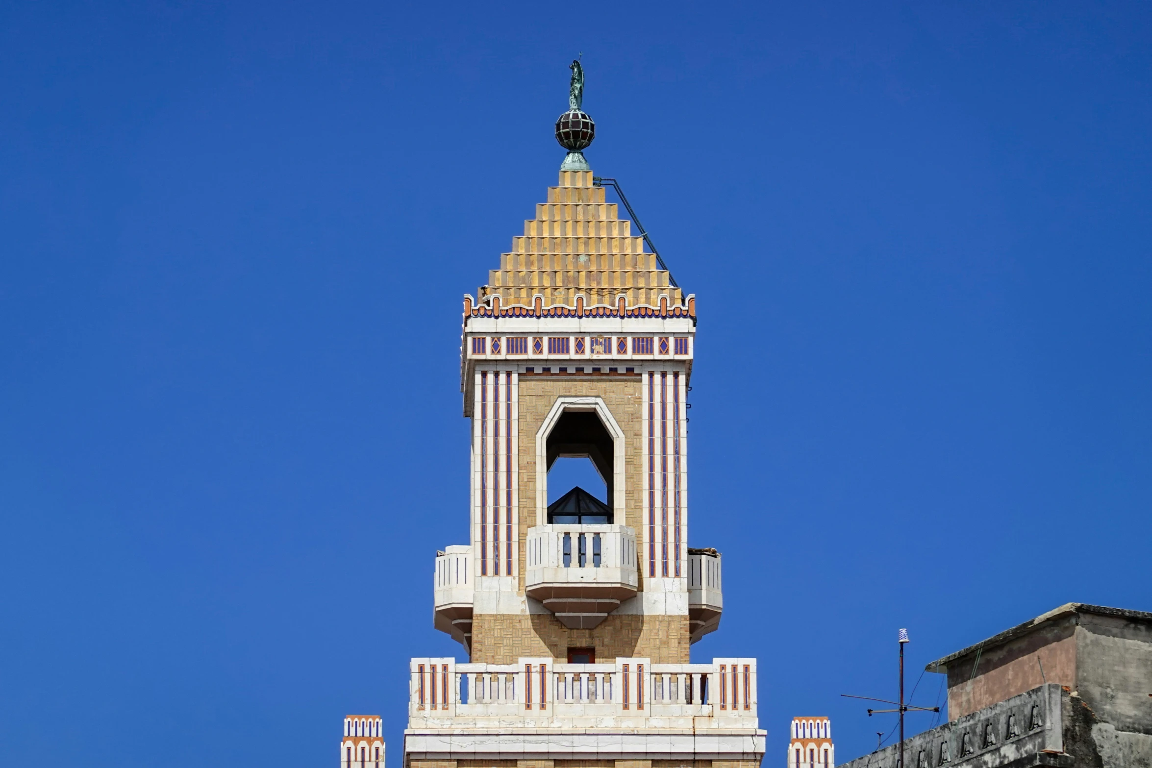 a large tower with a bell at the top of it