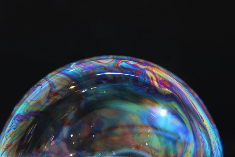 an image of multi colored marbles in a bowl