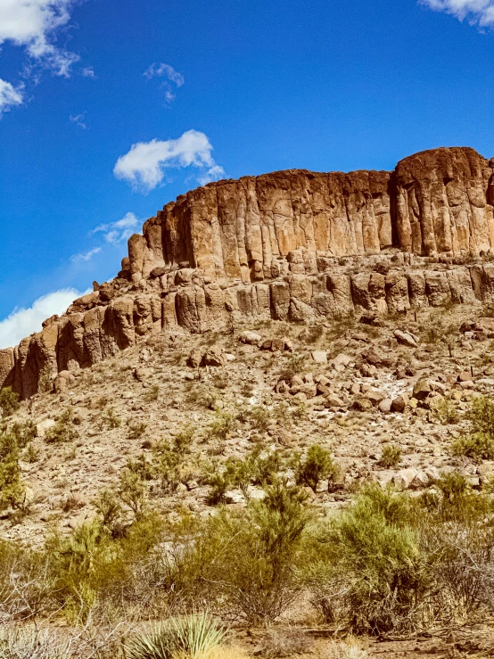 a tall rock formation in the desert