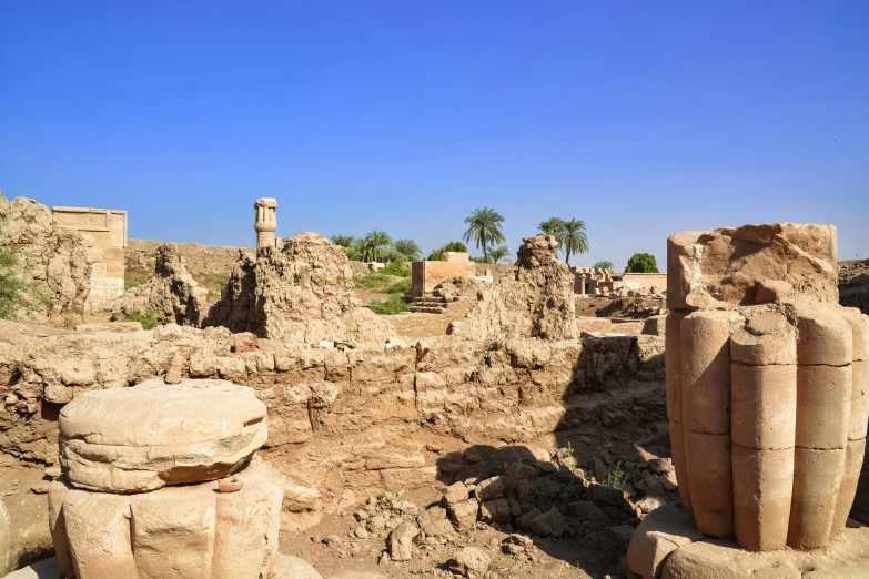 some big stone structures in the dirt