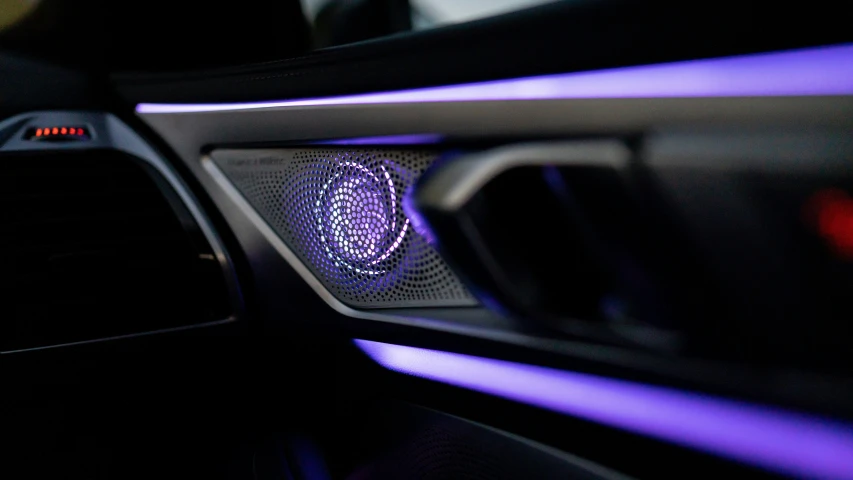 the car's head - up display is purple, black and silver