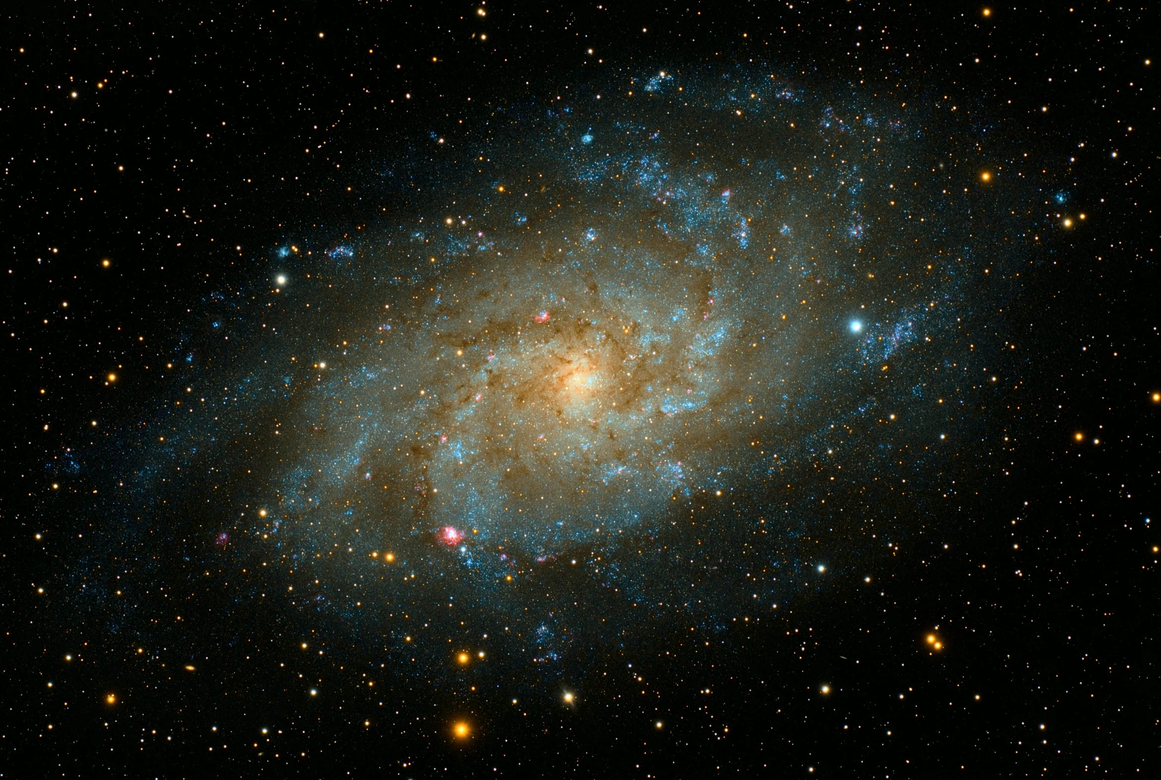 a bright blue star with many small white stars in the background