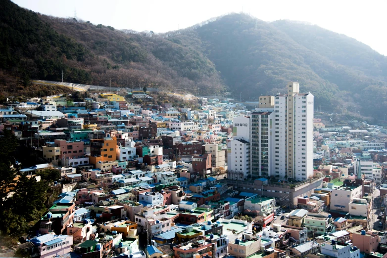 an aerial view of a city on a hill