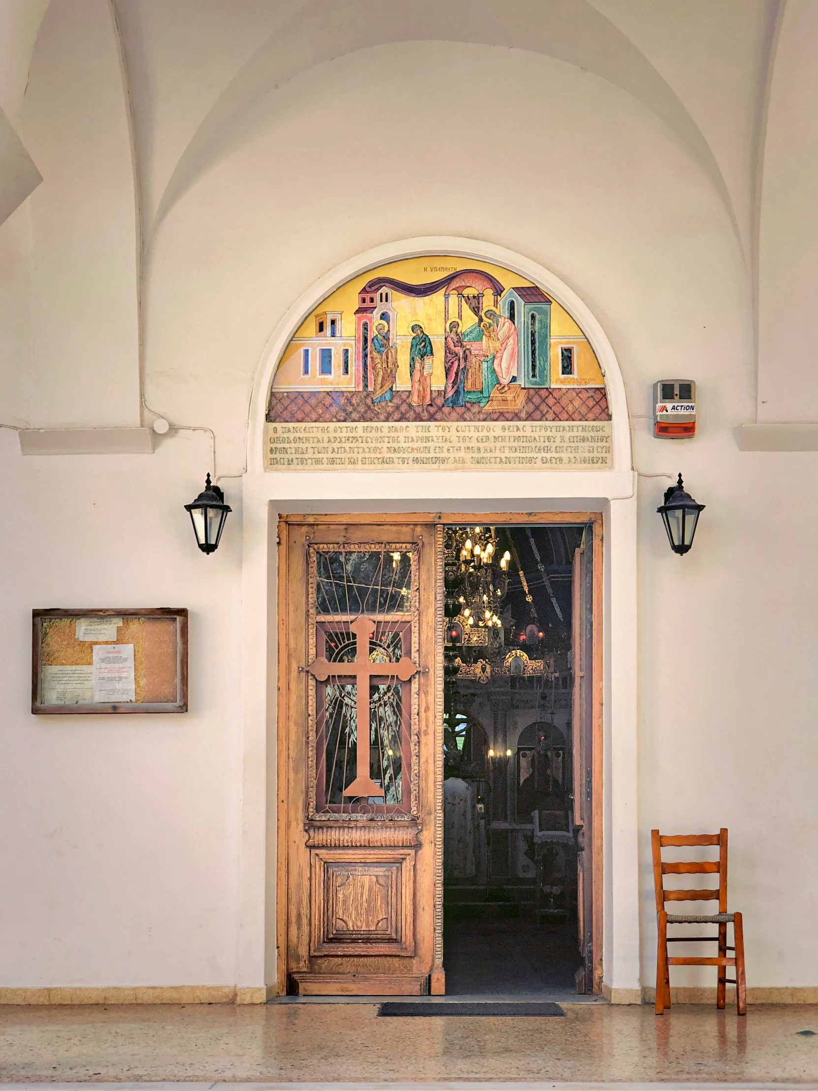 a very pretty doorway with some doors to it