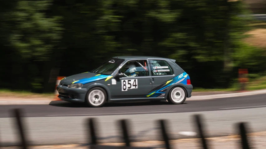 a car drives around a curve in a road