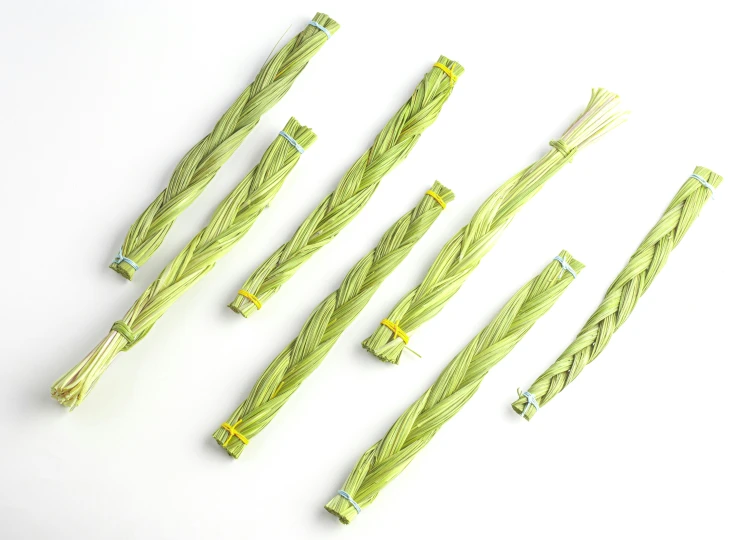 a picture of several bundles of green grass