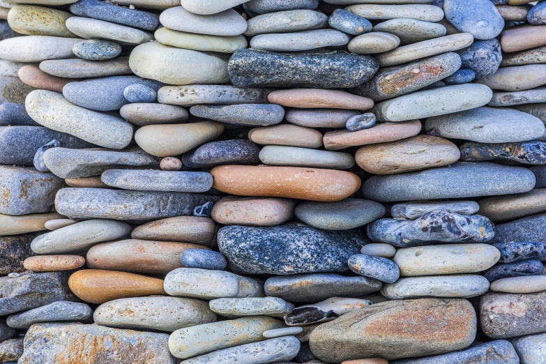 the rocks are stacked and all have different colors