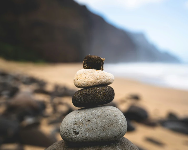 stones stacked on top of each other on the beach