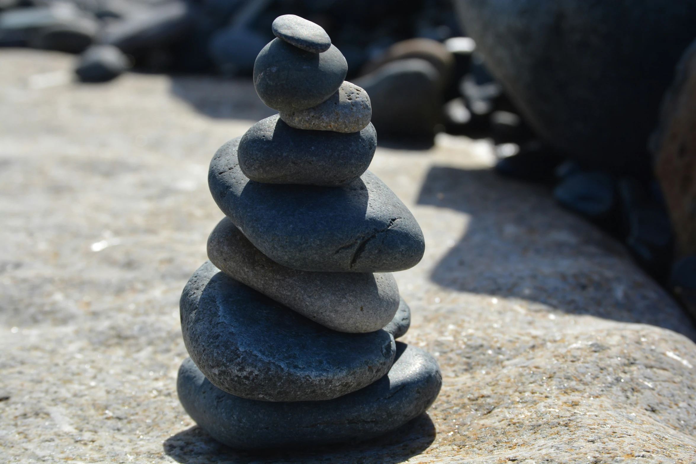 this is a rock tower outside in the sun