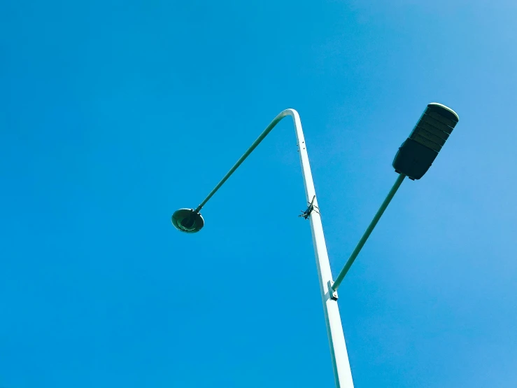 a traffic light is on top of the pole