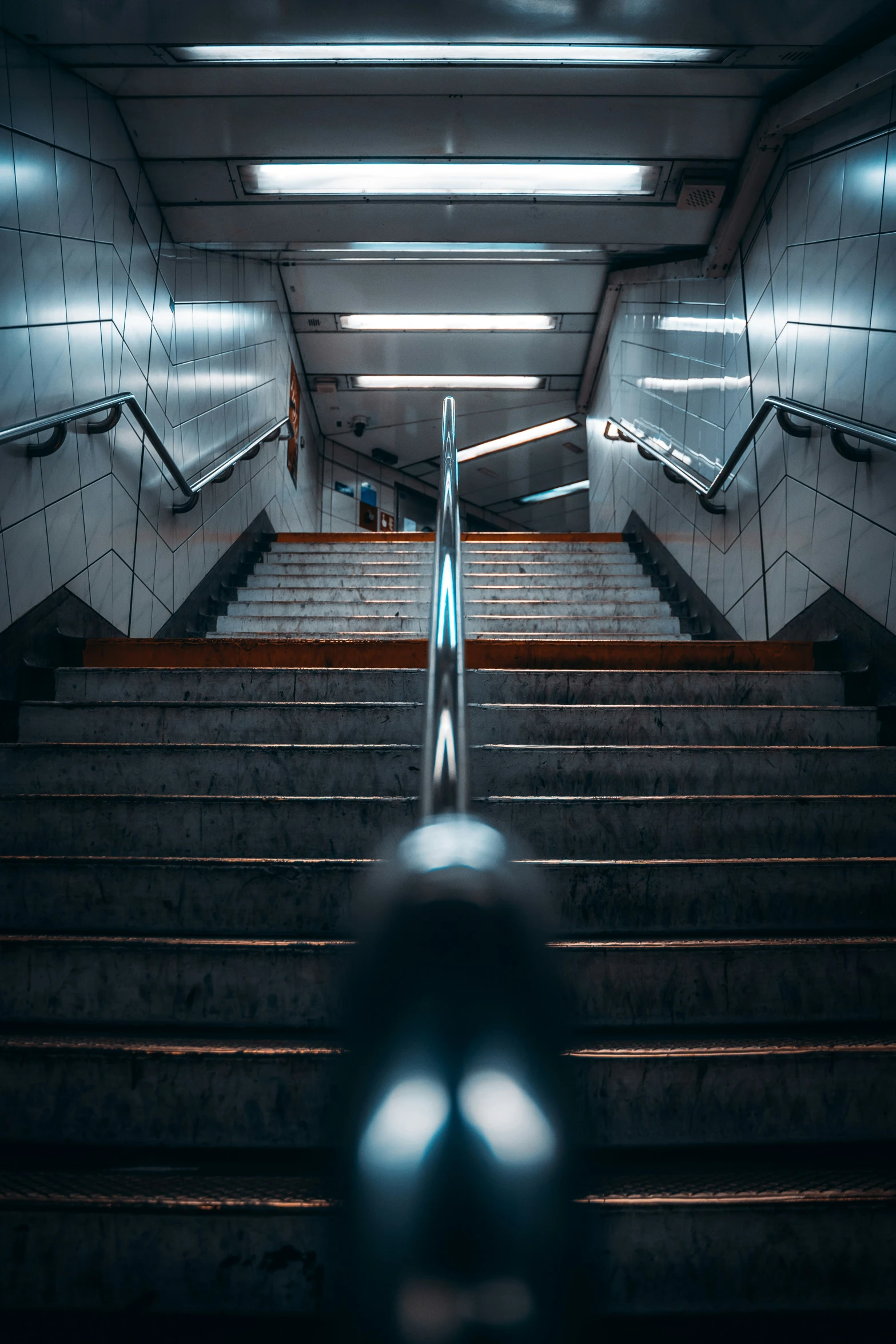 a view down a set of stairs from the ground