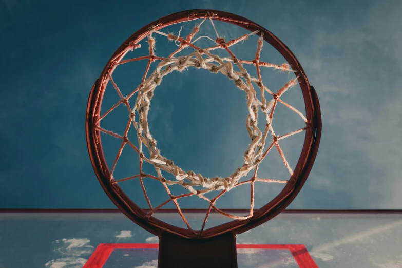 an image of a basketball hoop from below