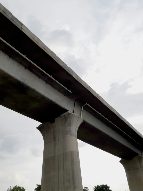 the view of a large bridge from below