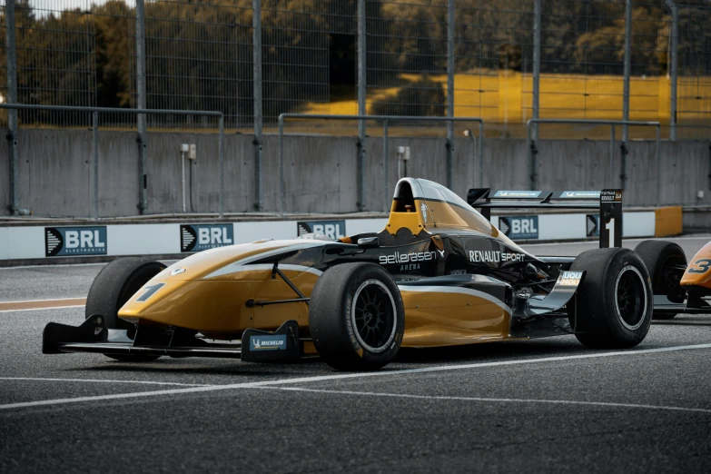 a racing car driving around on a track