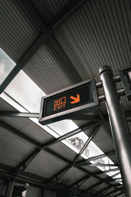 a metal sign pointing in two different directions