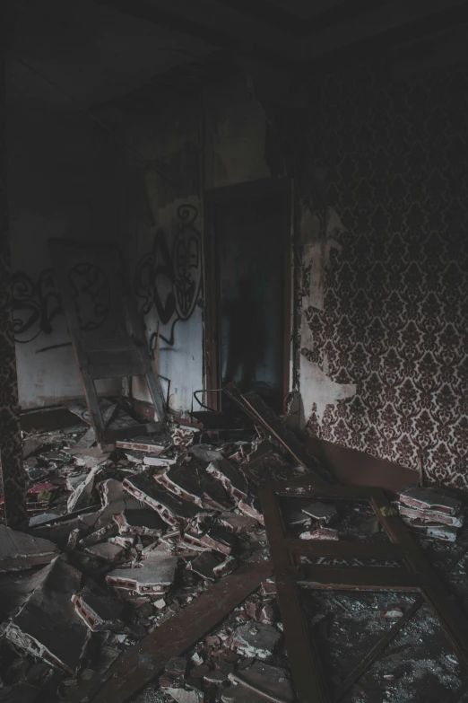 an abandoned room has broken into many pieces