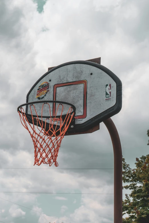 a basketball going into the hoop to shoot it