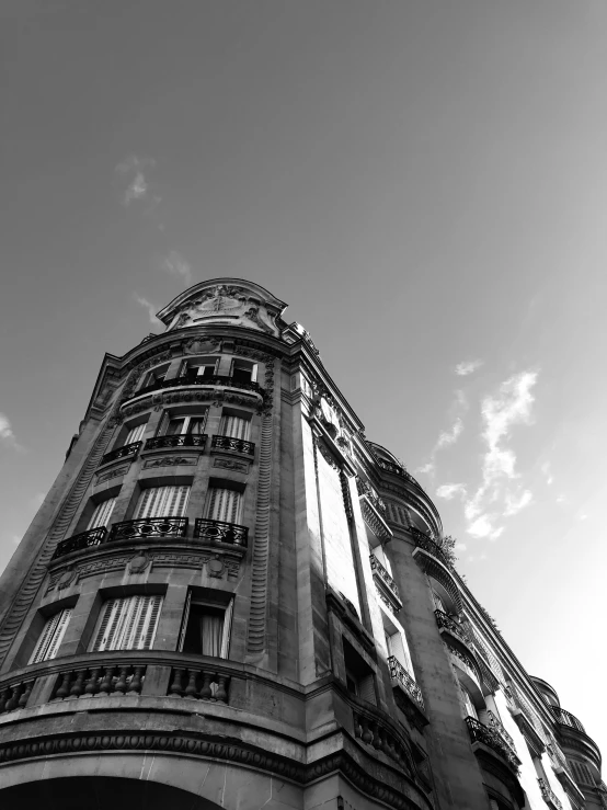 an old building is built with windows and balconies